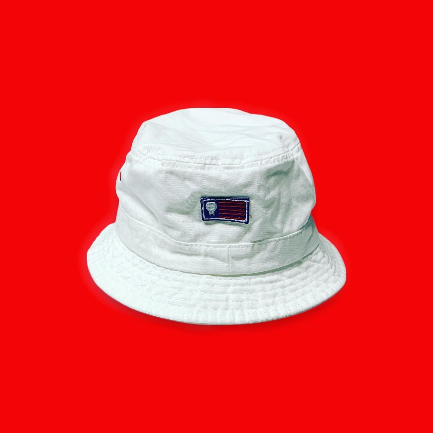 RE•BRAND YOURSELF™ BANNER BUCKET HAT - WHITE/NAVY/RED